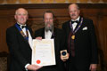 Mike Cowbourne of Okells receiving their award for 1907 (Gold for Ales, abv 6.0% - 7.4%).