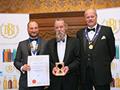 Okell & Son receiving their award for '1907' (Gold for IPA, abv 5.5% - 7.4%).