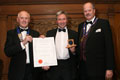Mark Anderson of Double Maxim Beer Company their award for American Pride (Silver for Ales, abv 5.0% - 5.9%).