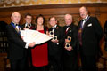 The Team of Harvey & Son (Lewes) receiving their awards for Star of Eastbourne (Diploma for Ales, abv 6.0% - 7.4%), Christmas Ale and Elizabethan Ale (Gold and Silver for Ales, abv 7.5% and above), Bill's Beer (Gold for Lagers, abv 3.5% - 4.2%), Bill Brewer and John Hop (Gold and Silver for Low/Non-Alcoholic Beer).